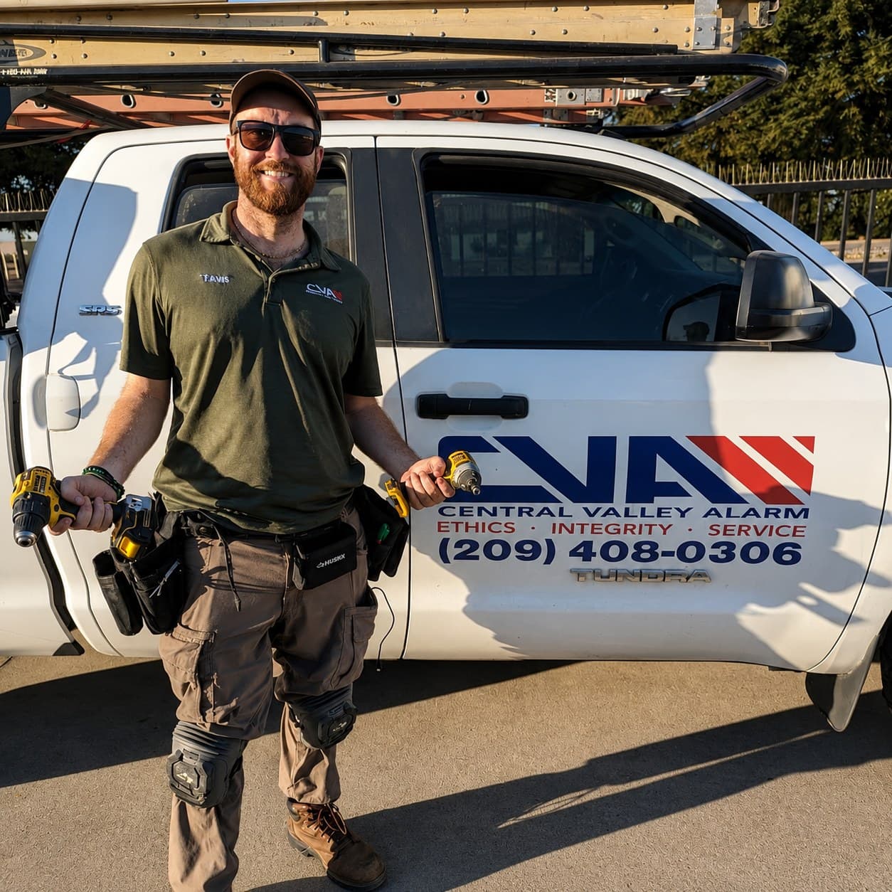 Travis Bailey with the Central Valley Alarm work truck